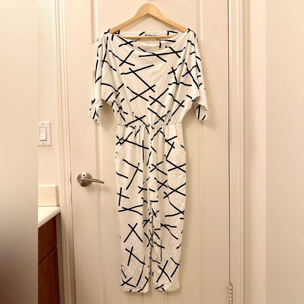 Fighting Eel Jumper Dion. Ivory Hashi print. Size XS
